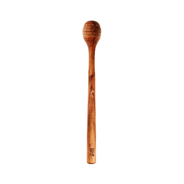 Le rouleau de miel en racine de teck