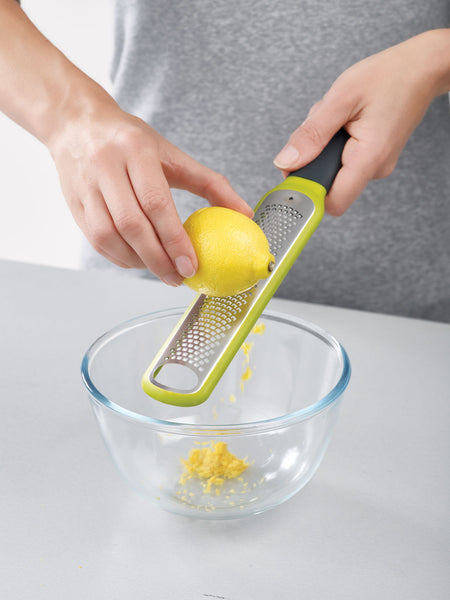Handi-Zest grater with cleaning attachment