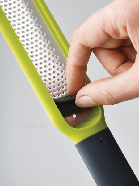 Handi-Zest grater with cleaning attachment