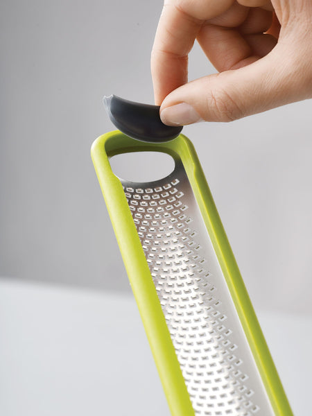 Handi-Zest grater with cleaning attachment