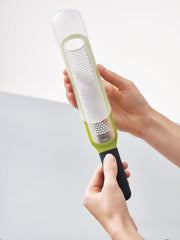 Handi-Zest grater with cleaning attachment