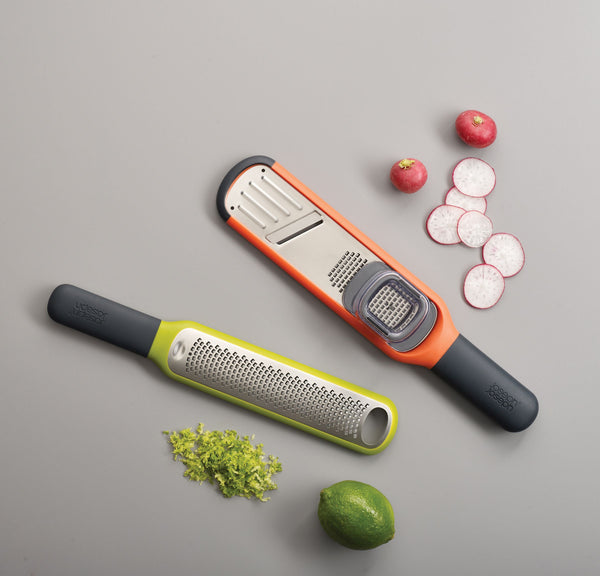 Handi-Zest grater with cleaning attachment