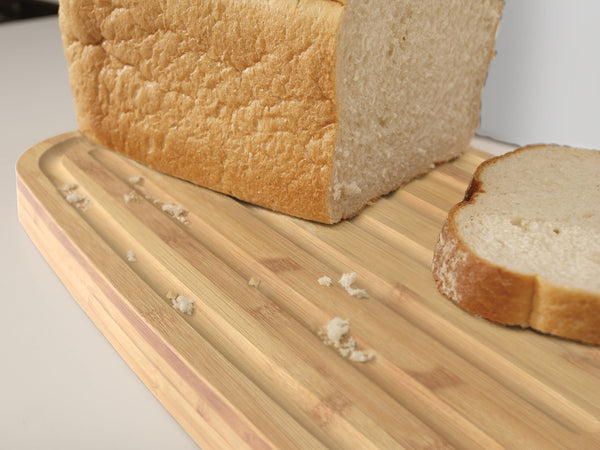 Boîte à pain avec couvercle faisant office de planche à découper